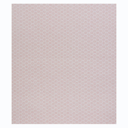 Soft blush woven wallcovering with a white honeycomb hexagon pattern and subtle textured weave.