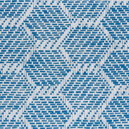 Blue and white woven wallcovering with a diamond basket-weave pattern and textured surface.