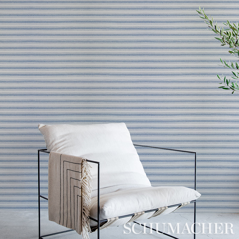 Blue woven wallpaper with a paperweave texture.