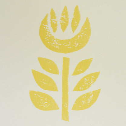 Yellow stylized tulip with a leafy stem and alternating leaves on a pale background