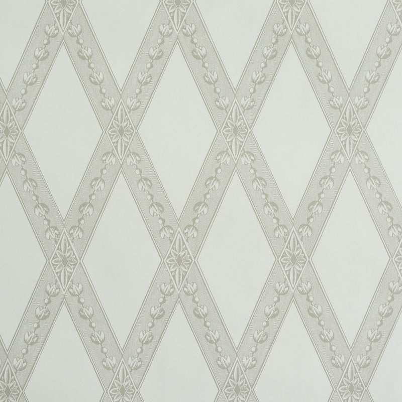 Cream wallpaper with a repeating diamond lattice and delicate floral borders in pale gray.
