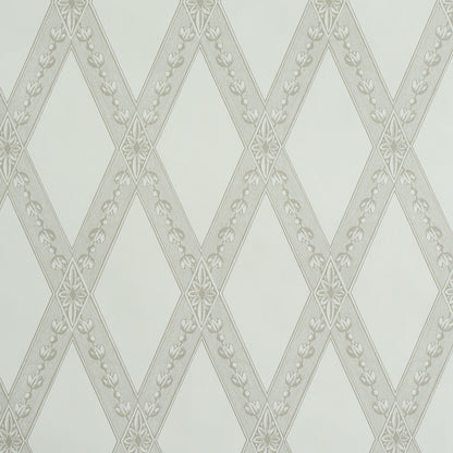 Cream wallpaper with a repeating diamond lattice and delicate floral borders in pale gray.