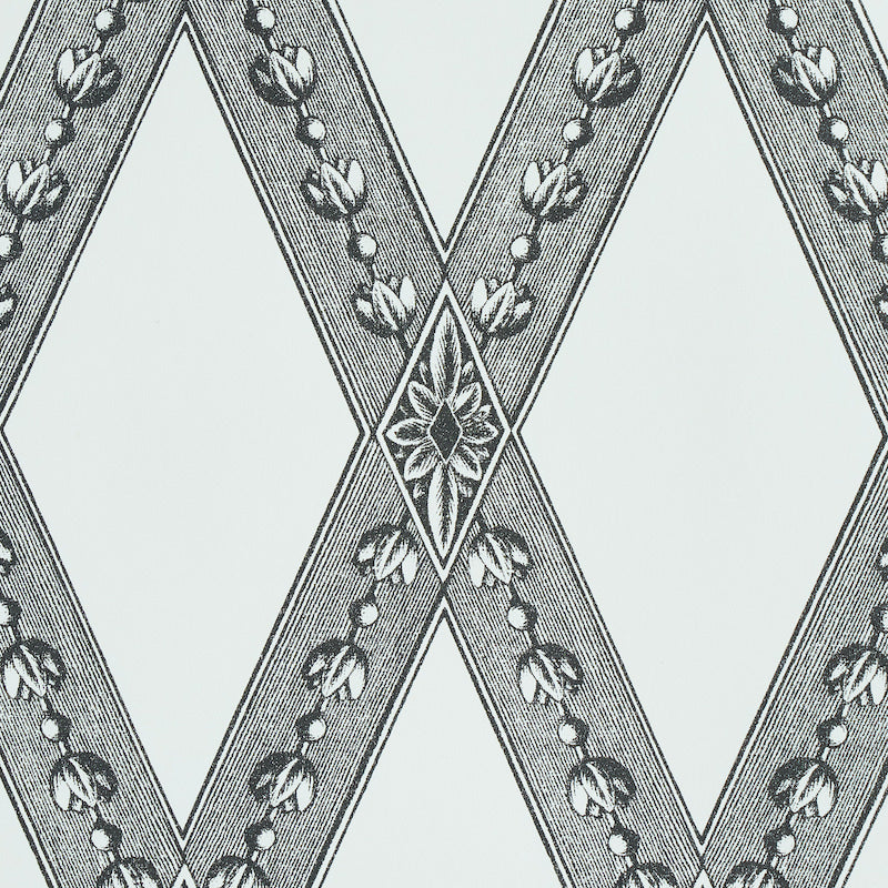 Grey geometric wallpaper with interlocking diamonds, ribbon-like bands, beaded chain & central floral motif.