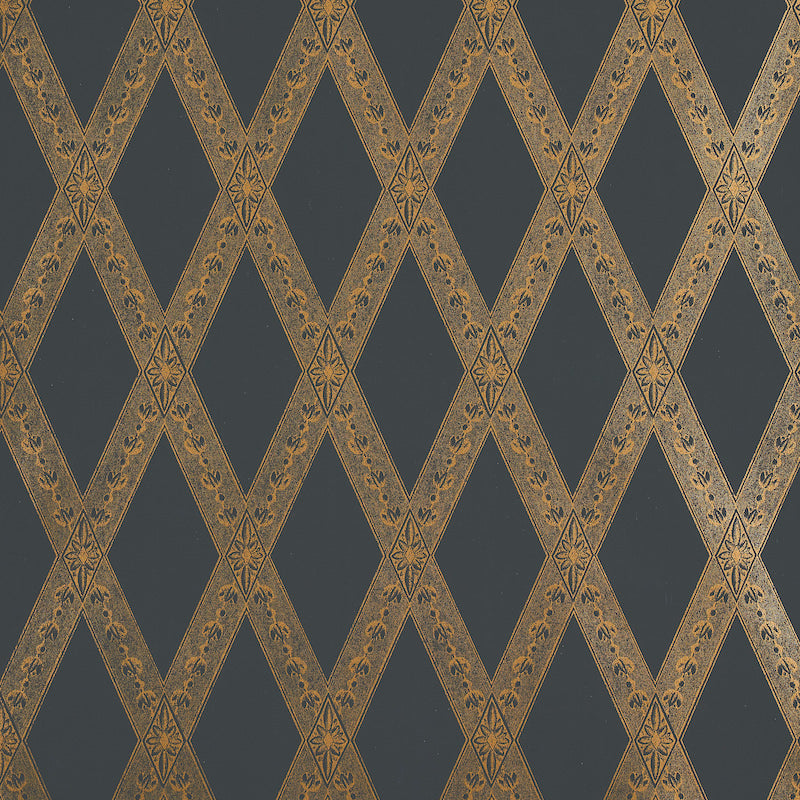 Gold-on-black wallpaper with a diamond lattice pattern and small floral motifs.