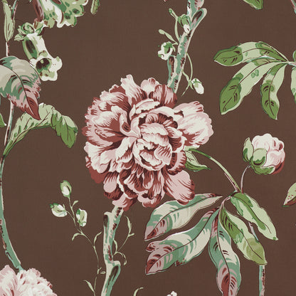 Brown background with oversized pink roses and green leaves in a vintage floral textile pattern.