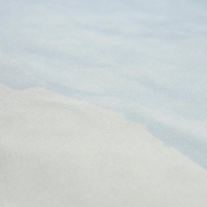Close-up of a soft textured wallpaper panel in pale blue and cream with a subtle looped texture.