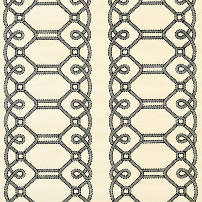 Black embroidered sisal fabric sample with a geometric pattern; suitable for curtains or upholstery.