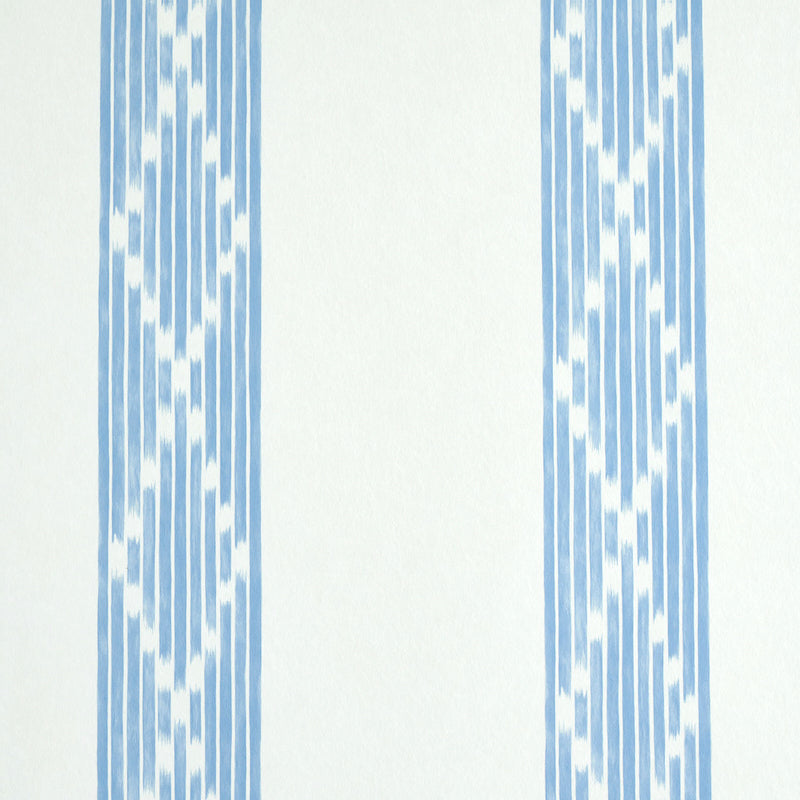 White wallpaper with two vertical blue ikat-style striped bands featuring geometric diamond motifs.