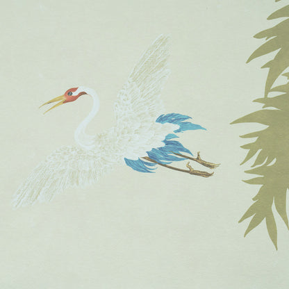 White crane in flight with outstretched wings, red crown, blue tail, pale background and palm fronds; stylized wall decor.