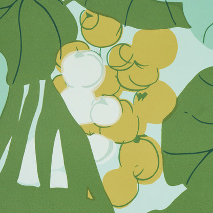 Palm leaves and sea-grape motif print on pale blue fabric.