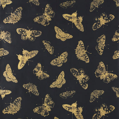Gold butterfly print on black fabric; metallic, foil-like pattern ideal for dresses, scarves or home decor.