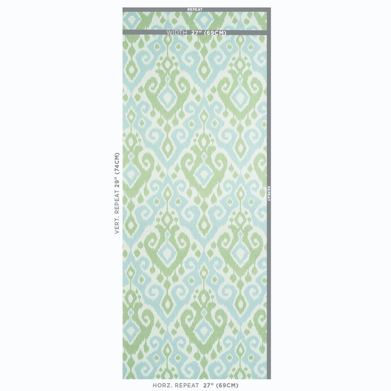 Ikat-inspired blue and sage green geometric pattern on pale background; wallpaper sample with vertical repeat.