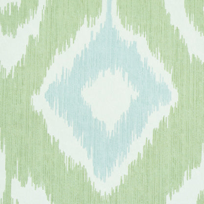 Ikat-inspired diamond pattern in mint green and pale blue on white textile.
