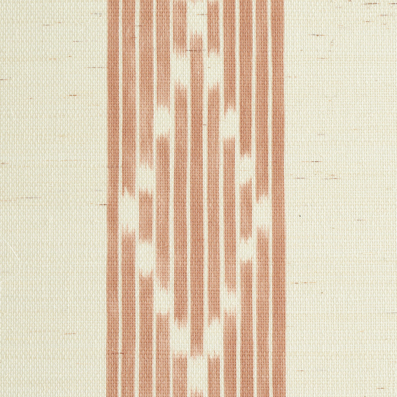 Ikat-inspired fabric with rust-orange vertical stripes and zigzag accents on a cream background.
