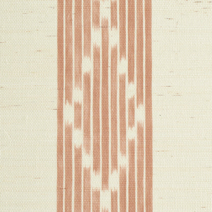 Ikat-inspired fabric with rust-orange vertical stripes and zigzag accents on a cream background.
