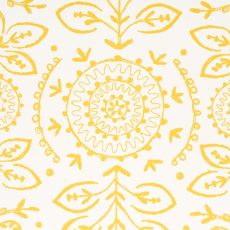 Yellow circular mandalas with sun-like spokes and repeated leaf motifs across fabric.