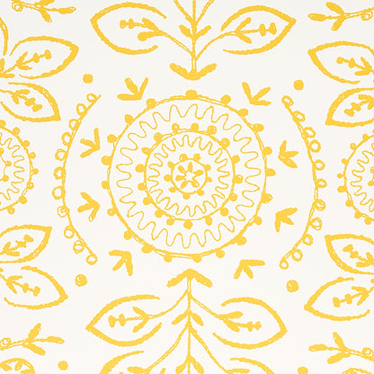 Yellow circular mandalas with sun-like spokes and repeated leaf motifs across fabric.