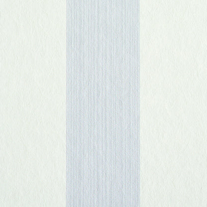 Ivory backdrop with a wide pale blue-gray vertical stripe; subtle textured finish.