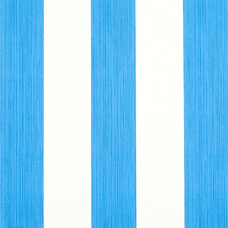 Cobalt blue vertical striped wallcovering with white gaps; textured stripes.