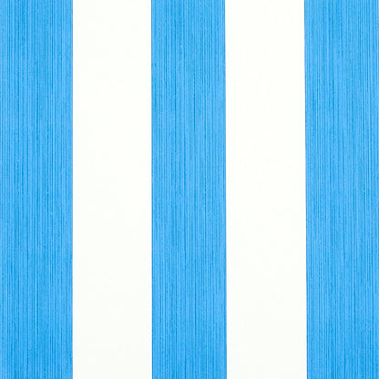 Cobalt blue vertical striped wallcovering with white gaps; textured stripes.