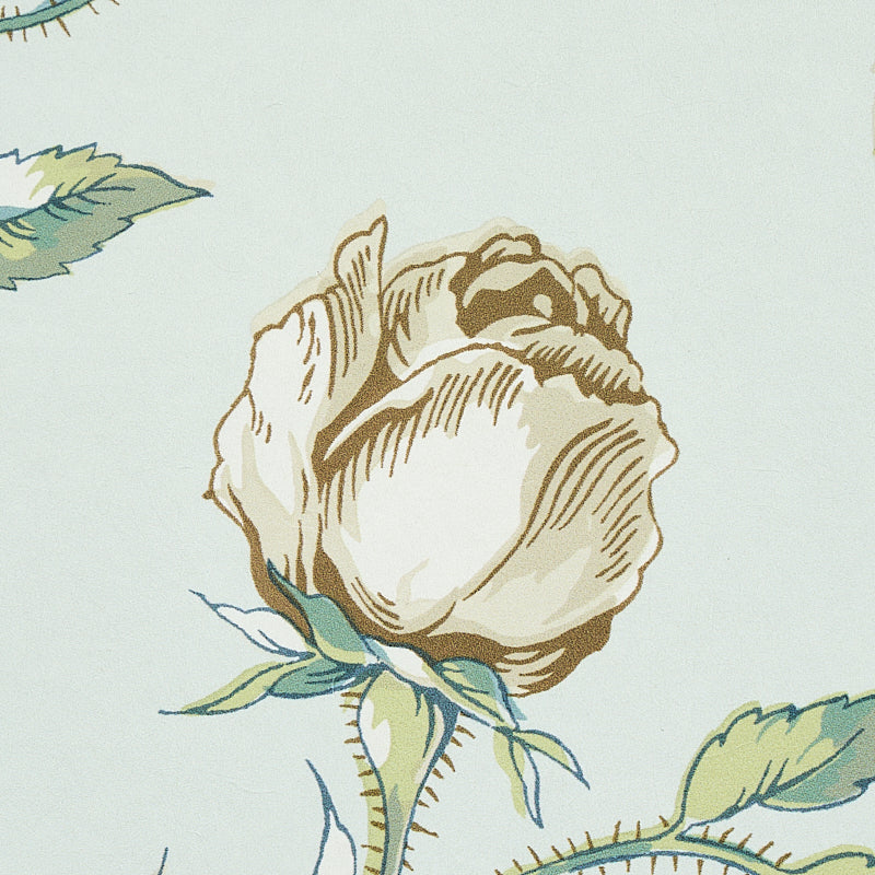 Beige rose botanical print on pale mint background with green leaves; vintage textile/wallpaper motif.
