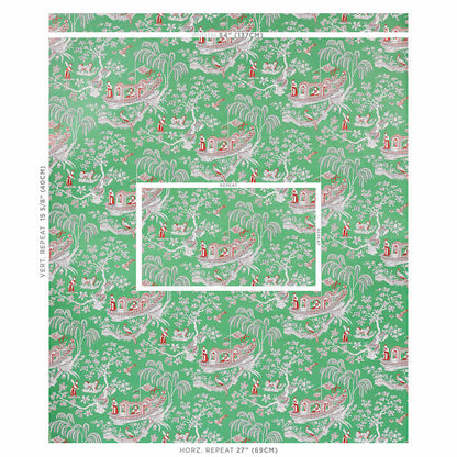Green toile print with pink and white tropical scenes, including palm trees, bridges and houses; ideal wallpaper or fabric.