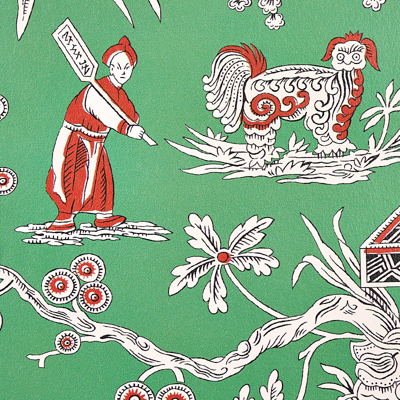 Green fabric with red-and-white folk-art scene: a figure with banner beside a dragon-like white creature, with floral branches.