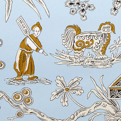 Blue textile with a chinoiserie motif: robed figure holding a sign, stylized rooster, and white flowers with vines in brown and ivory.