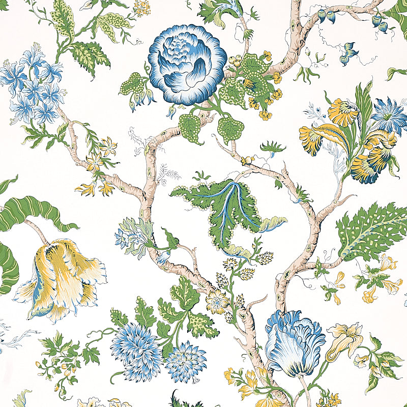 Whimsical botanical floral pattern with blue, green, and yellow flowers and twisting vines on white background