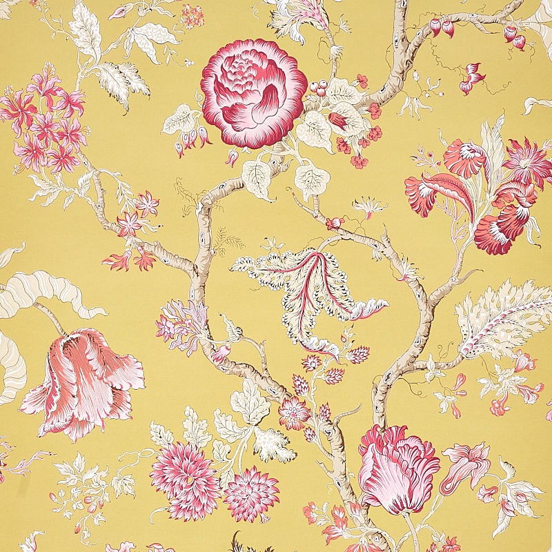 Yellow wallpaper featuring pink-red blossoms and white-outlined florals on winding branches, vintage botanical pattern.