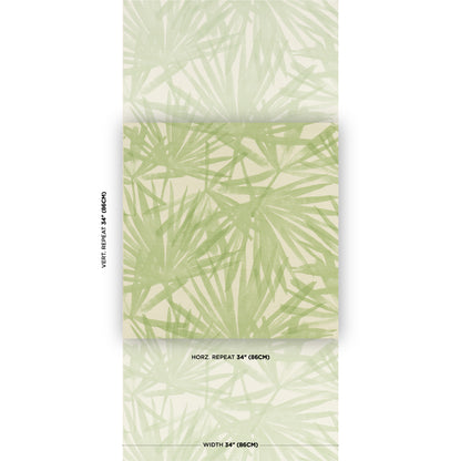 Soft green palm-leaf print sisal rug in pistachio tones on a light background.