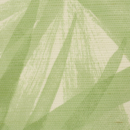 Lime-green textile with pale cream geometric shapes and a woven, draped-fabric look.