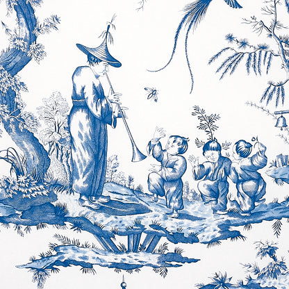 Blue-and-white toile print of a robed man with a horn entertaining three children in a garden scene.