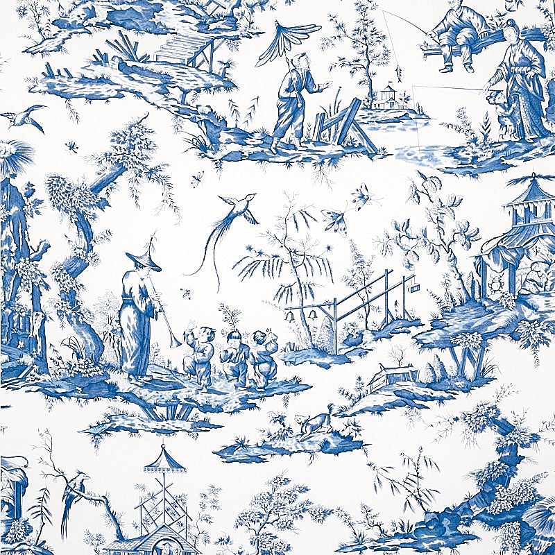 Blue-and-white toile fabric featuring pastoral scenes, trees, pagodas, birds, and people in a countryside landscape.