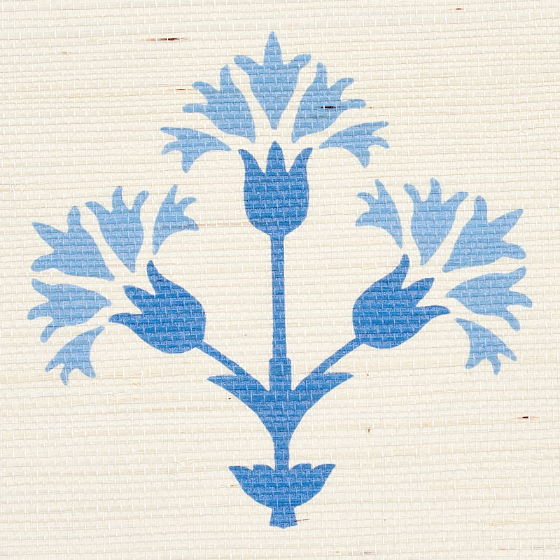 Blue botanical motif with three tulip-like blossoms on cream textured fabric; tile-inspired pattern.