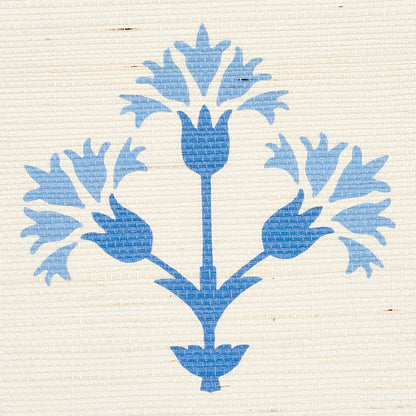Blue botanical motif with three tulip-like blossoms on cream textured fabric; tile-inspired pattern.