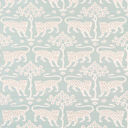 Soft blue fabric with white leopard silhouettes and pink tree motifs in a repeating decorative pattern.