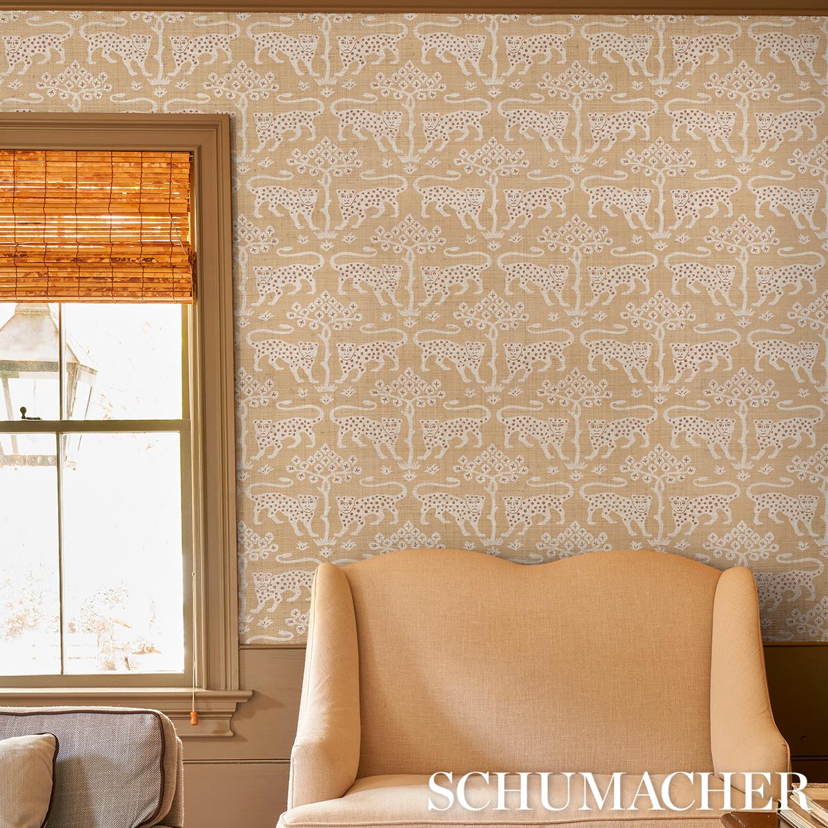 Woodland Leopard Sisal Wallpaper by Schumacher in oatmeal featuring a hand-drawn mirrored leopard and tree motif on textured natural sisal wallpaper for luxury interiors, statement walls, and sophisticated neutral home decor.