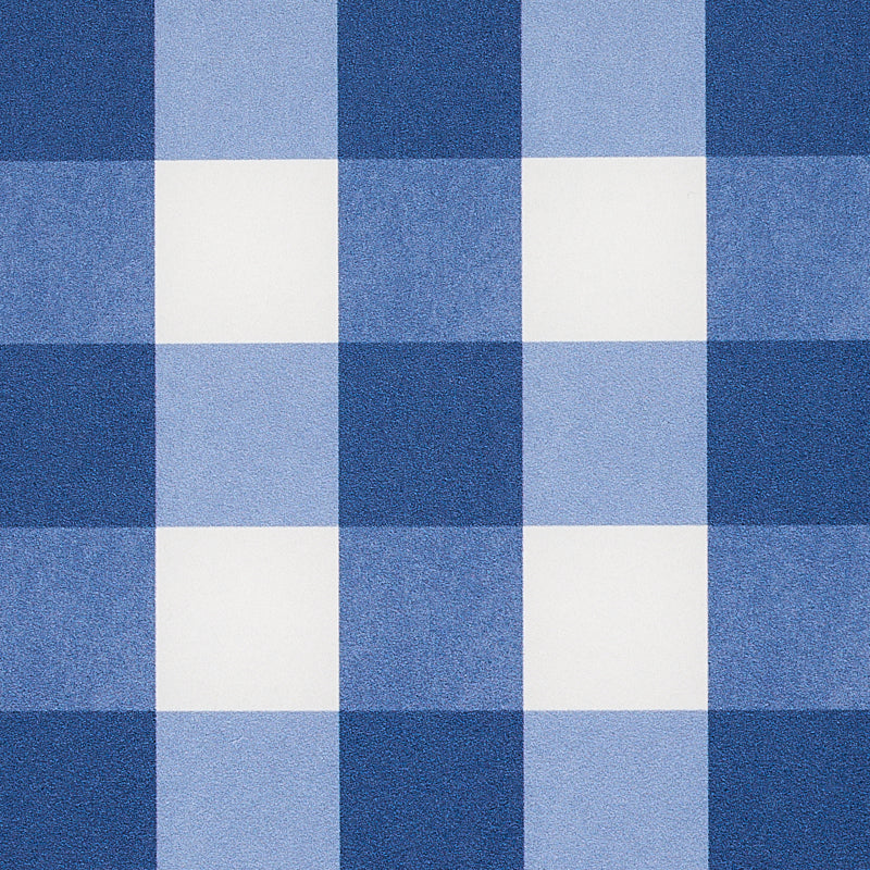 Blue and light-blue plaid wallcovering with white squares; subtle textile texture.