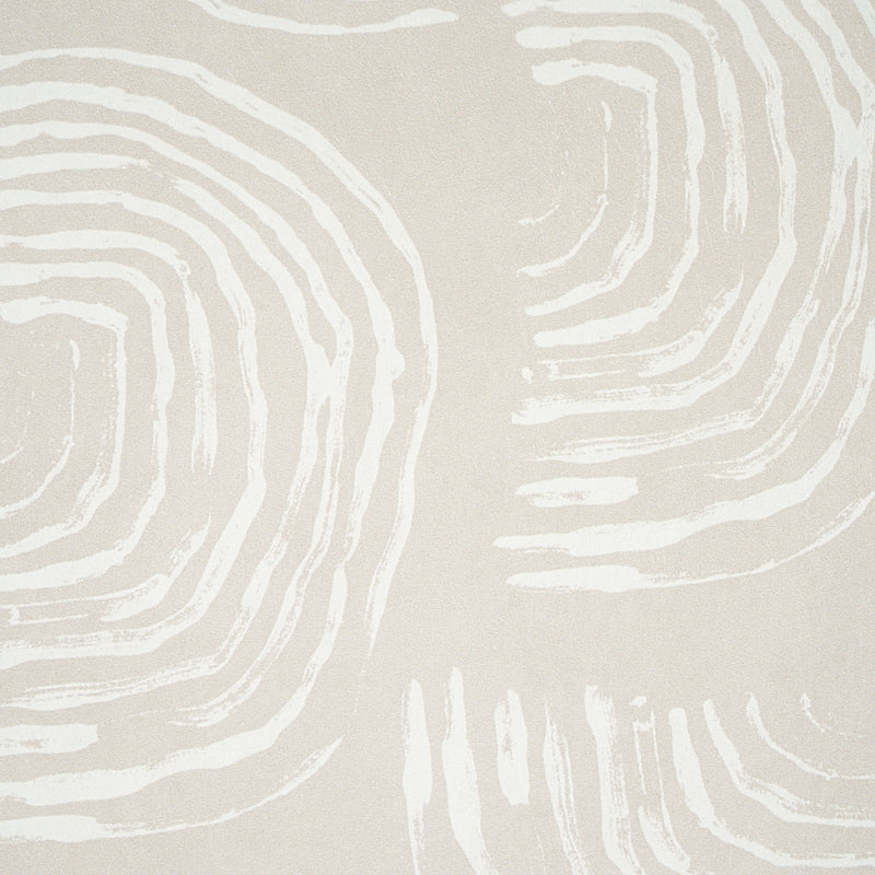 Beige rug with white fingerprint-inspired concentric swirl pattern; modern minimalist textile.