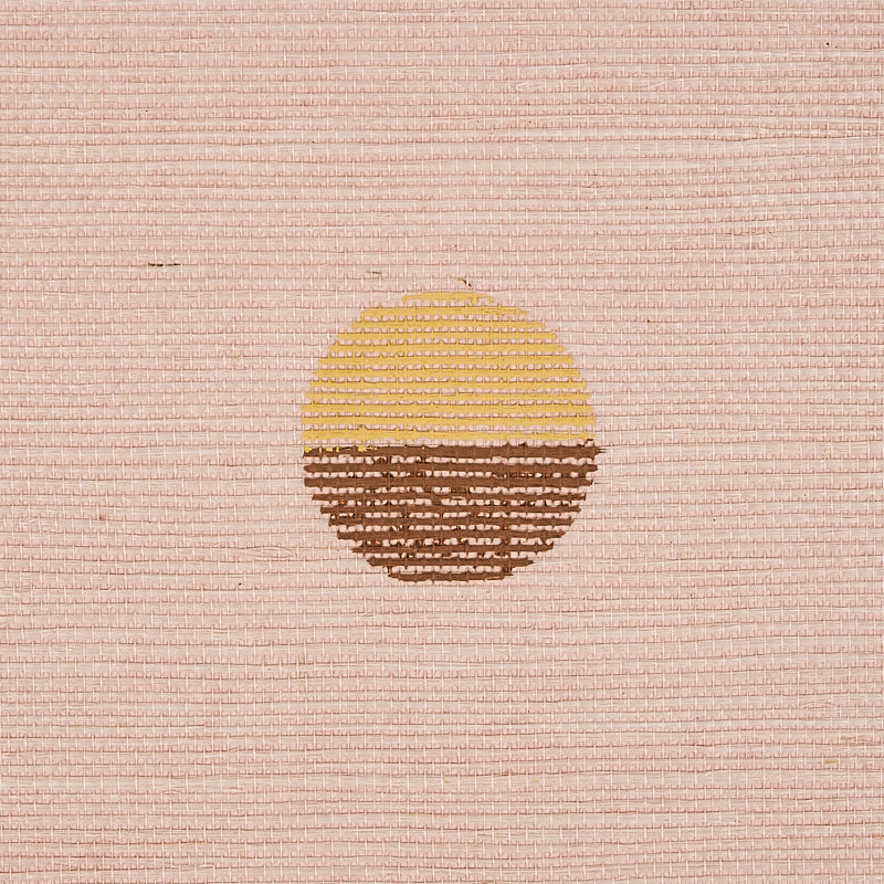 Peach hand printed sisal with a circular sun motif, yellow on the upper half and brown on the lower half.