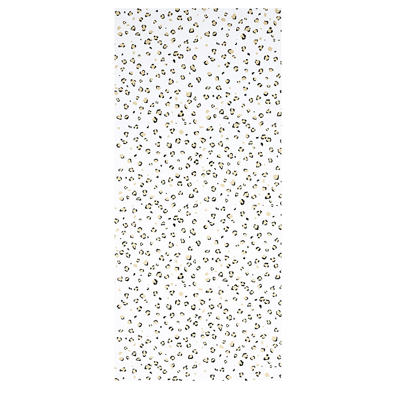 Cream background with scattered black & tan leopard spots in a classic leopard print.
