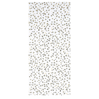 Cream background with scattered black & tan leopard spots in a classic leopard print.