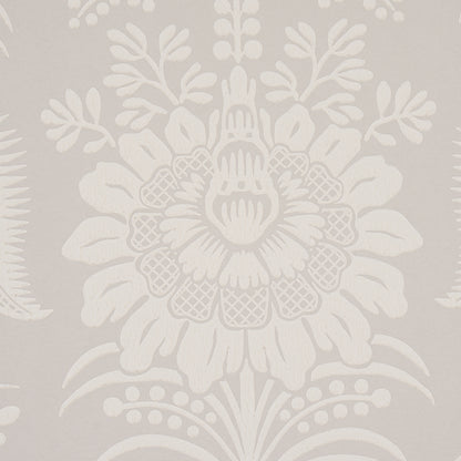 Beige wallpaper with a large white damask floral pattern and leafy detailing.