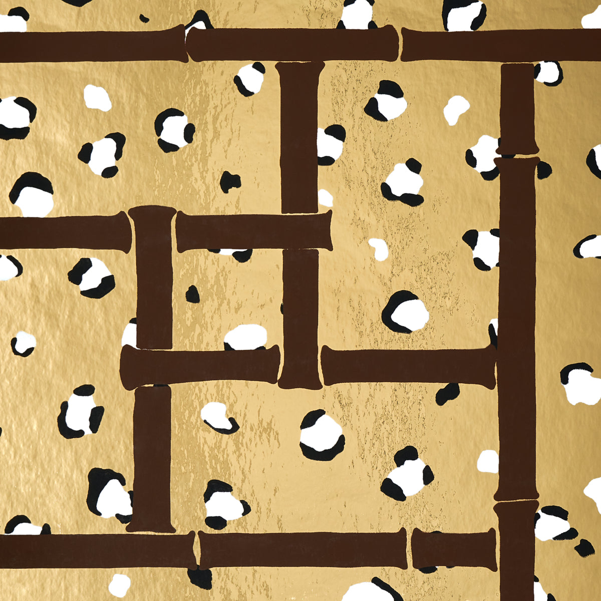 Gold textured wallpaper with dark brown bamboo lattice over a leopard-like white & black spot pattern.