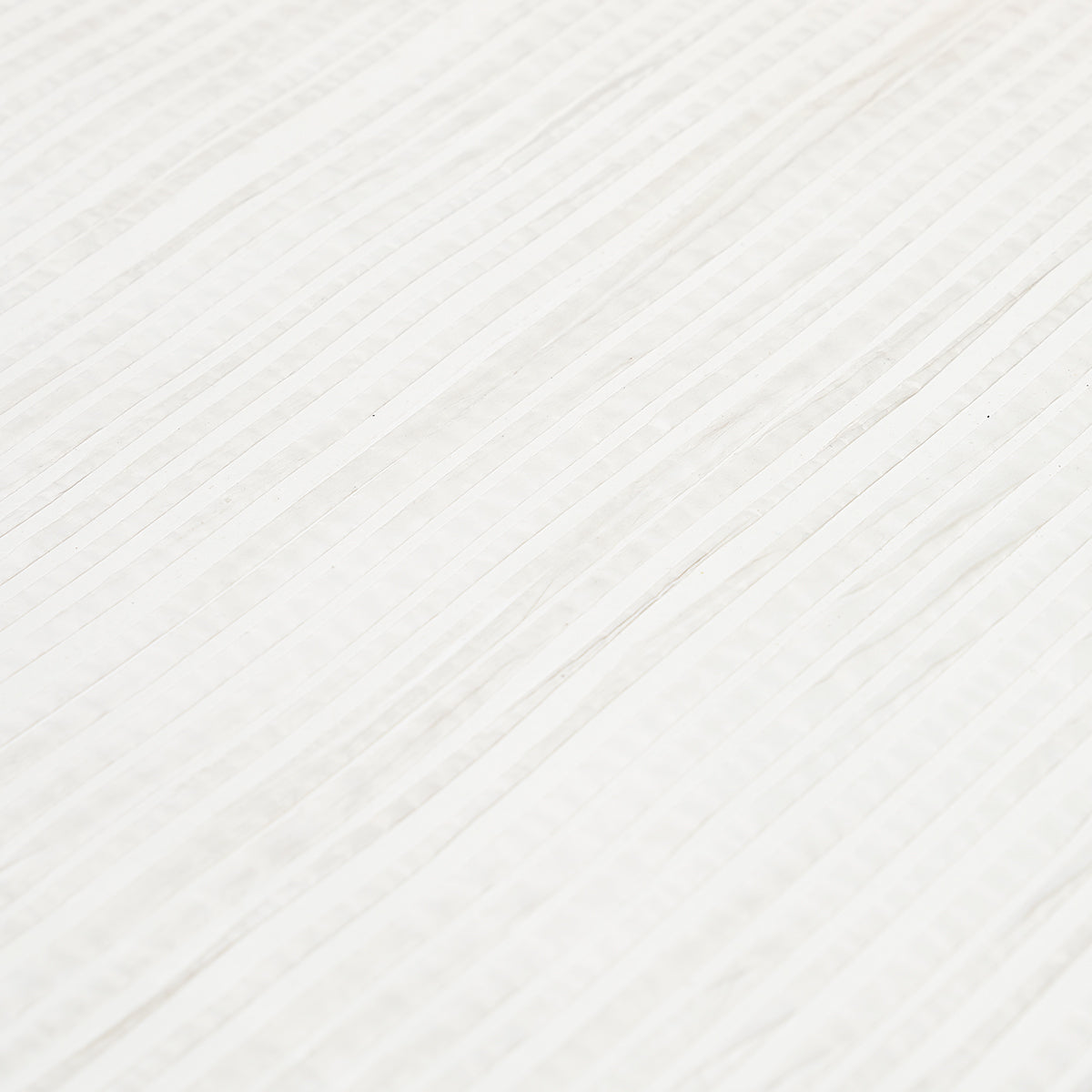 White textured wallcovering with a grasscloth-style stripe pattern.