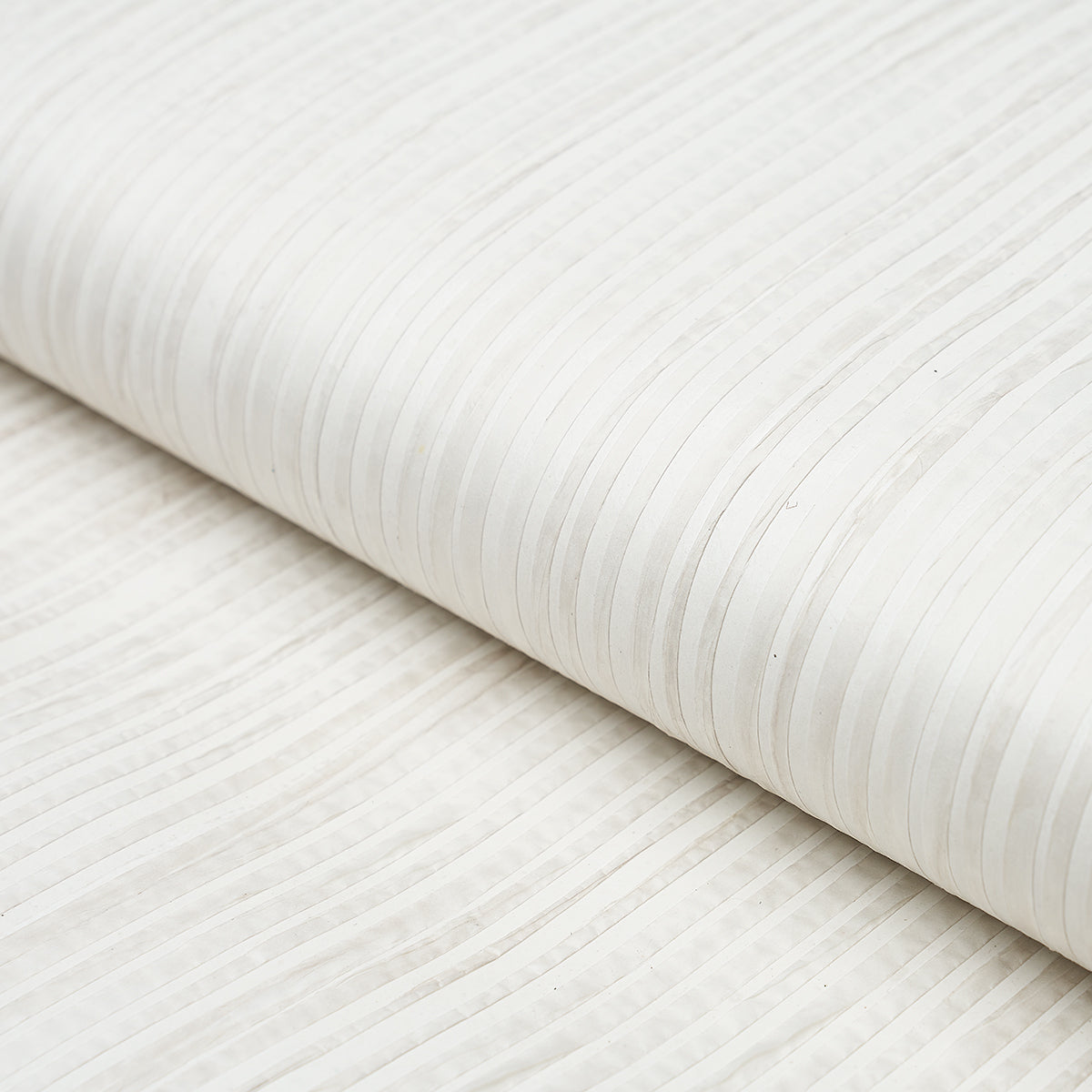 White ribbed striped textured wallcovering, rolled bolt (paper stripe)