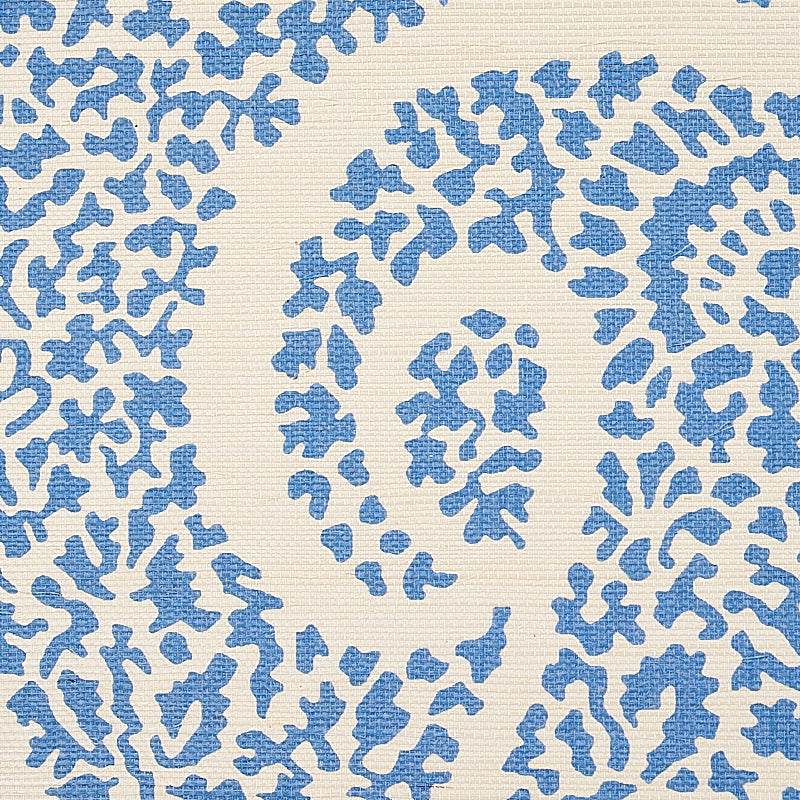 Bright blue printed grasscloth with a paisley motif.