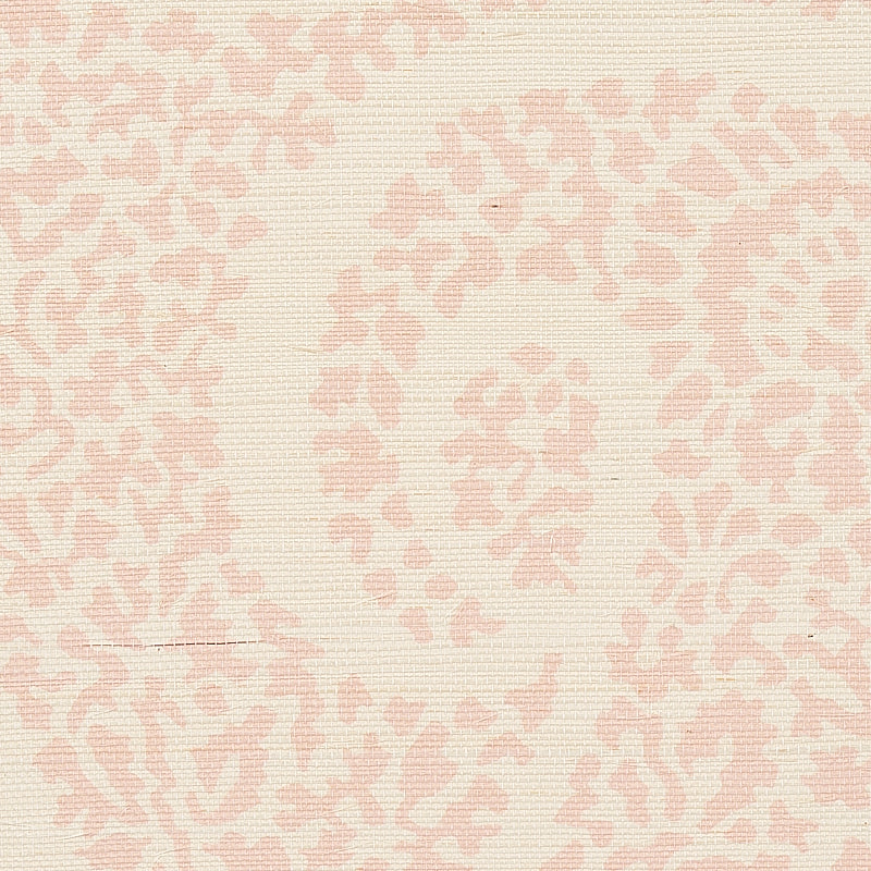 Cream grasscloth wallpaper with a pale pink paisley motif and natural textured weave.