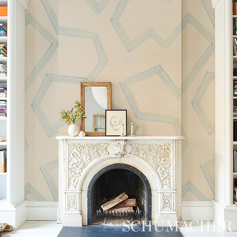 Blue grasscloth wallpaper with a woven texture on the wall